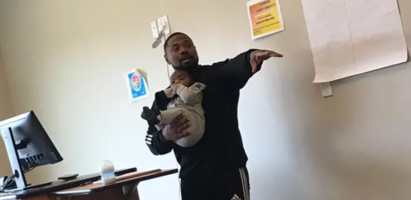 Professor goes viral for holding student’s baby during class: ‘Teachers wear more than one hat’